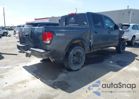 2012 Nissan Titan Pro-4X z USA, uszkodzony, nr VIN 1N6BA0EC7CN304116